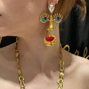 Surreal Face Motif Gold Earrings